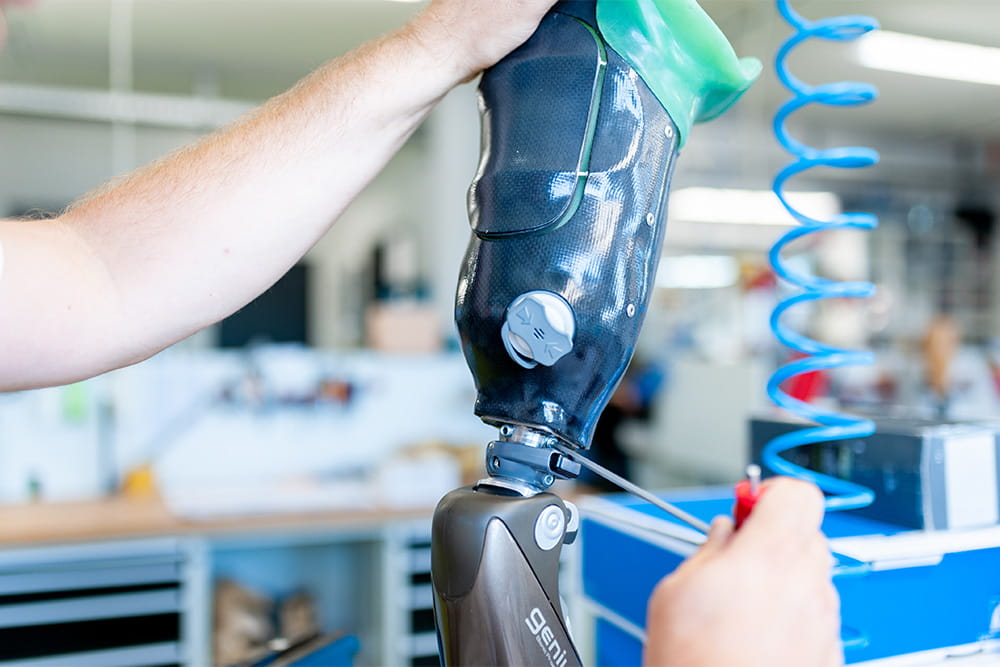A close-up of a prosthetic leg in the workshop.