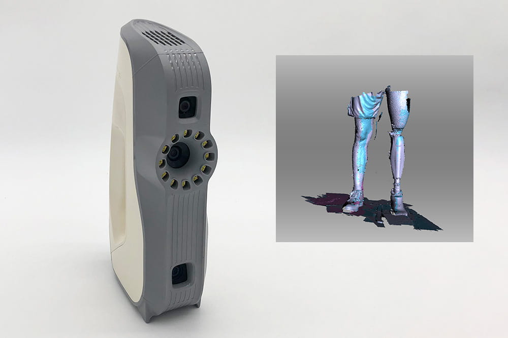 An Eva scanner standing upright and next to it is a 3D scan result.